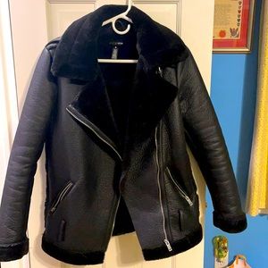 Faux leather / fur inside aqua bomber